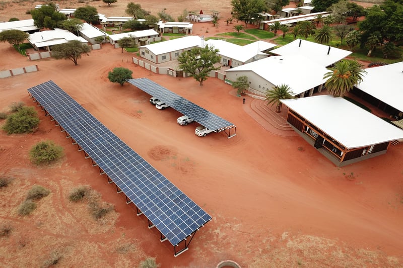 Solar panels shading the parking at Kalahari Anib Lodge, Namibia
