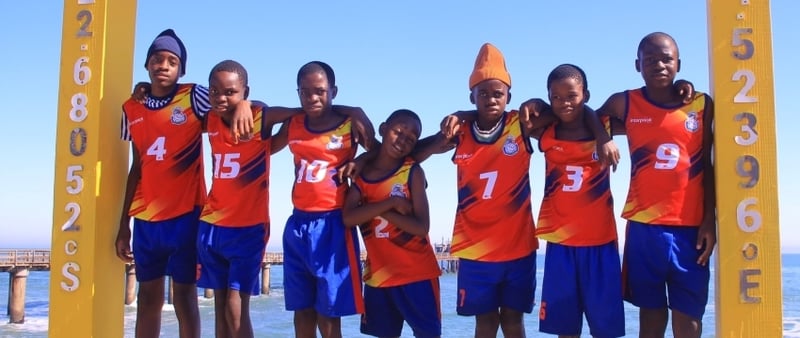 Young athletes from the Jella Charity Volleyball Academy competing at the MTC Dome Youth Festival Tournament in Swakopmund after receiving travel support from Gondwana Care Trust and Namibia2Go.